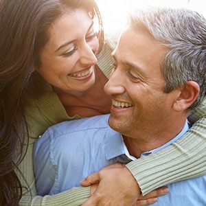 Middle-aged couple smiling together