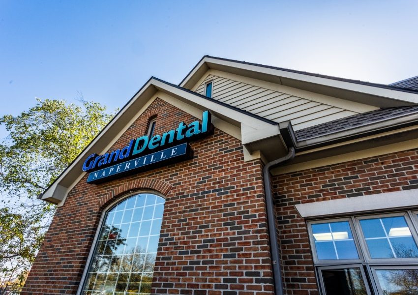 Grand Dental Naperville sign on dental office building