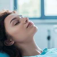 Woman in the dentist’s chair under oral conscious sedation
