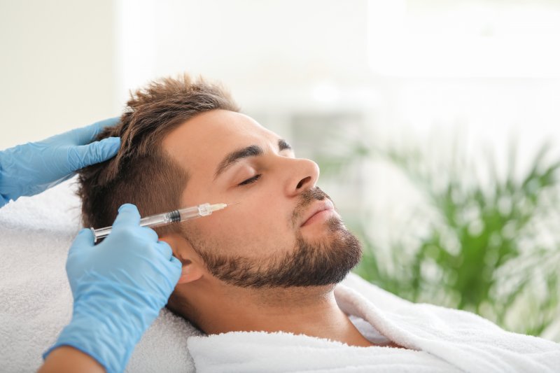 man receiving Botox treatment