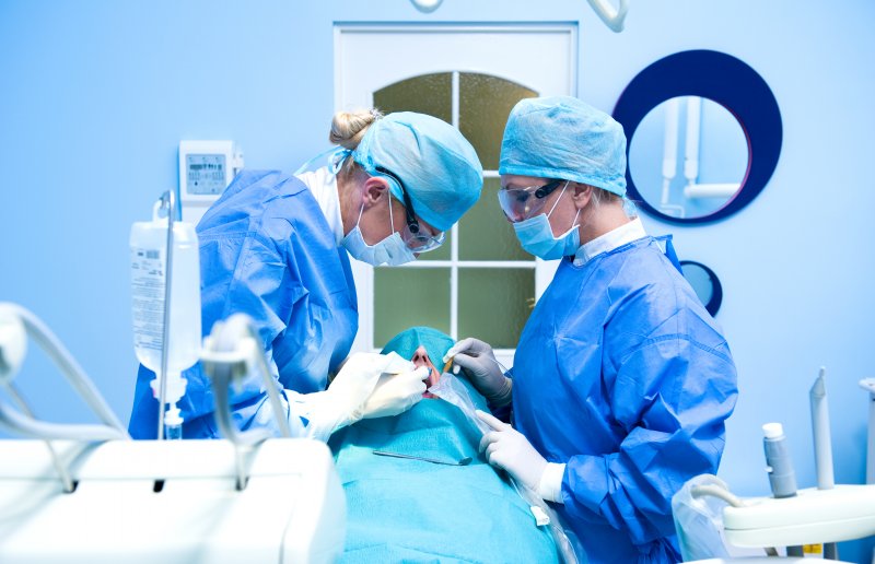 person undergoing dental implant surgery