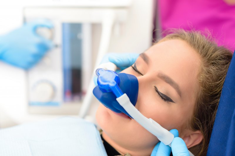 female patient receiving nitrous oxide